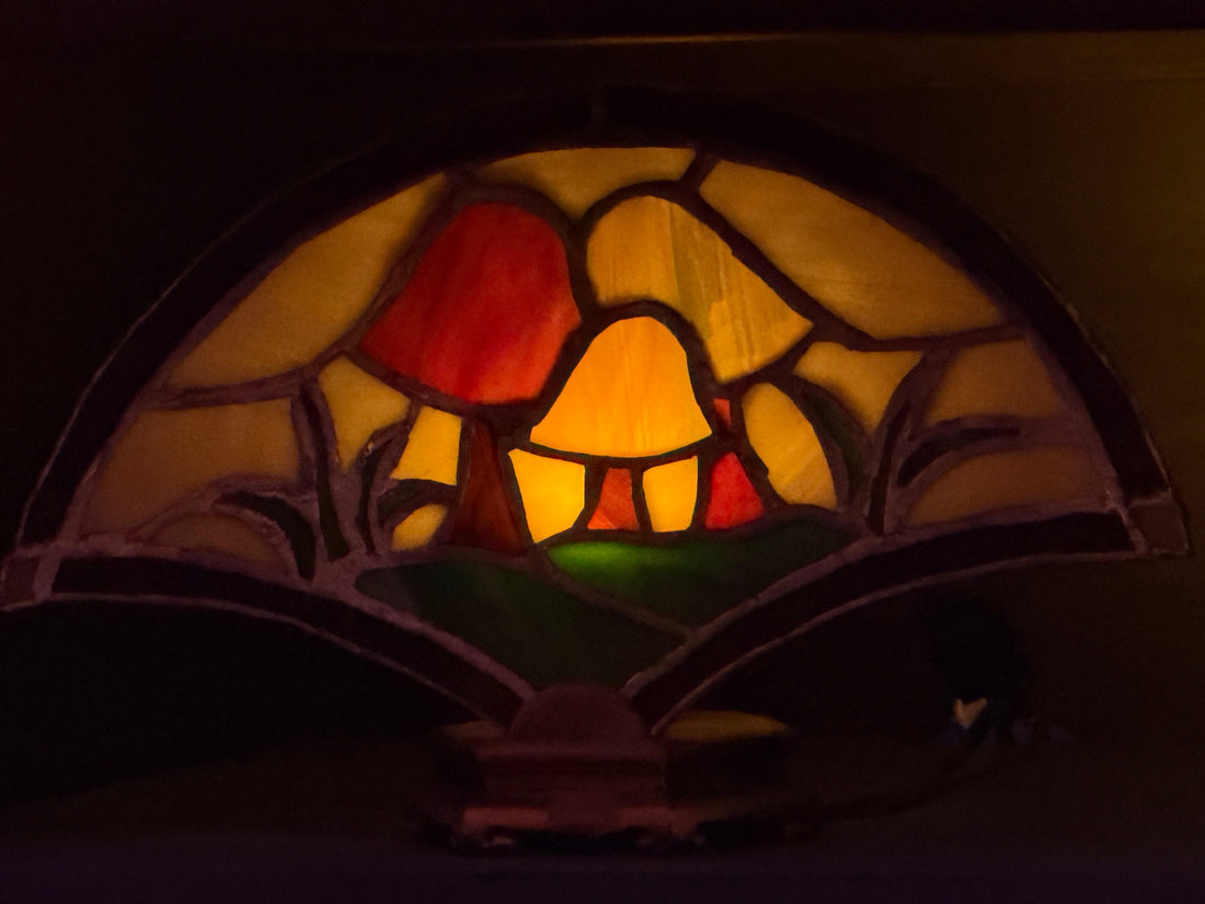 Handcrafted stained-glass artwork created by my parents, inspiring the craftsmanship behind Trail Paws Supply.
